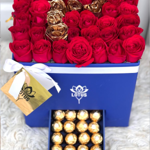 Caja de 25 rosas con ferreros